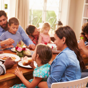 Family and friends sitting at a dining table Family and friends sitting at a dining table