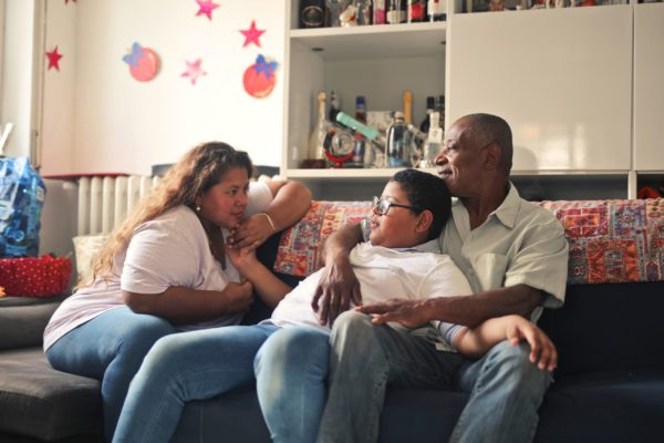 family portrait on the sofa at home