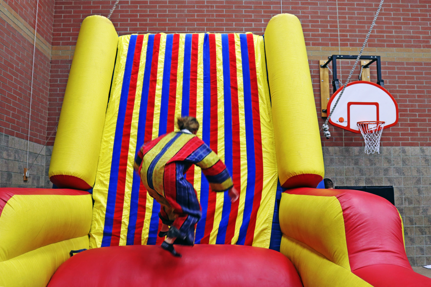 Ryan Chance on inflatable Velcro wall] - The Portal to Texas History